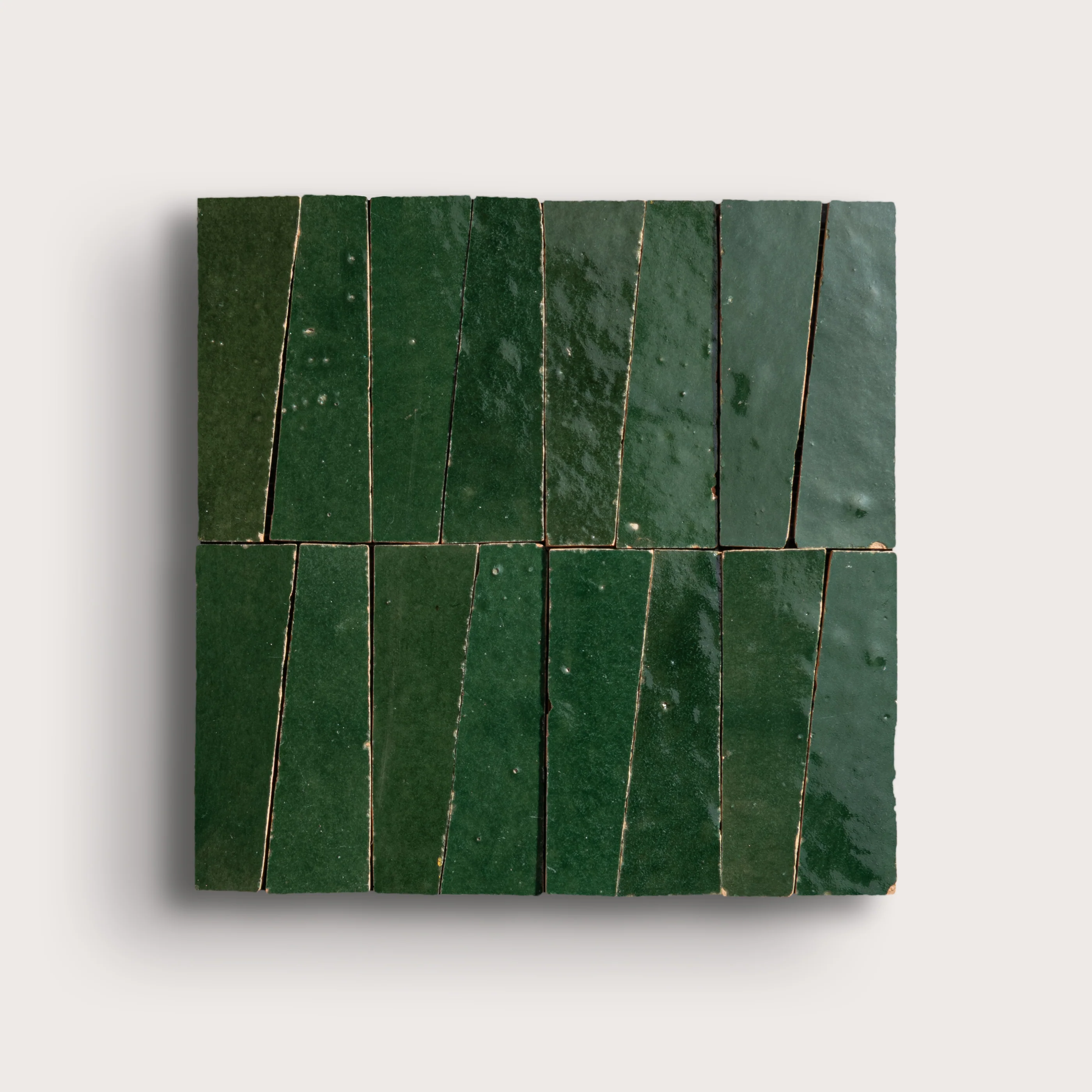 Sample: Emerald Green 1x4 Trapezoid Mosaic Zellige Tile